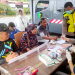 Warga Kota Sampit Antusias Sambangi Layanan Kesehatan Mobile Rumkit Bhayangkara Polda Kalteng. (Foto : ist)