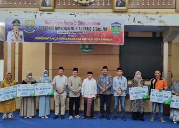 8 Ahli Waris Program BKBK di Kerinci - Sungai Penuh Terima Santunan. (Foto : ist)