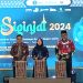 Hesnidar Haris, Sudirman dan Warsono membuka Siginjai 2024. (Foto : Rolan - sinarjambi.com)