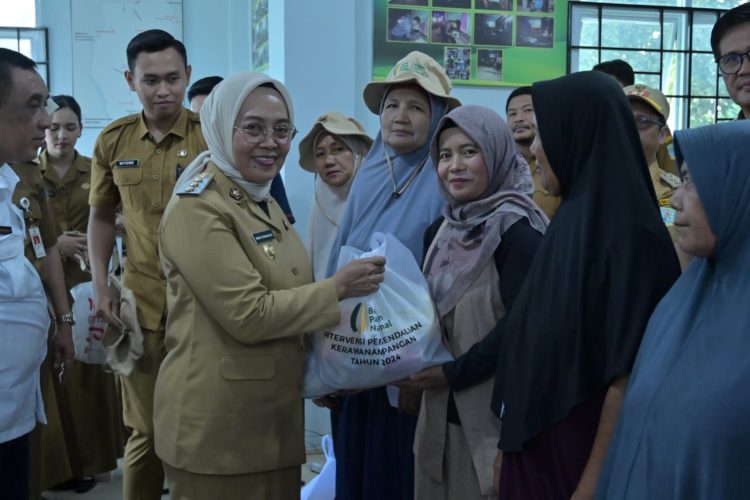 Hadiri Launching Bantuan Pangan Nasional, Pj Wali Kota Jambi Harap Entaskan Kemiskinan. (Foto : ist)