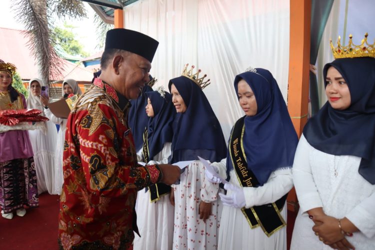 Wabup apresiasi wisuda pelajar juz 30 di SMPN 1 Merangin. (Foto : ist)