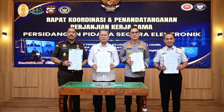 Polda Jambi Perkuat Sinergi Aparat Penegak Hukum melalui Persidangan Pidana Secara Elektronik. (Foto : ist)